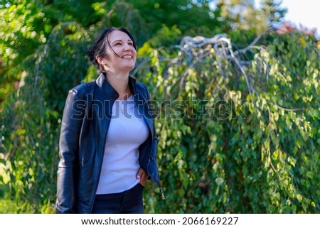 Similar – happy twin sisters stand on a bridge and look up