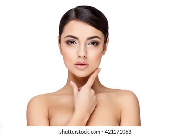 Young brunette woman with beautiful clean skin