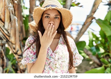 Young brunette woman outdoors on a sunny day of summer stressed and frustrated with hand on head, surprised and angry face 