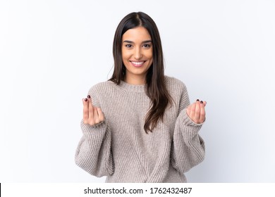 Young Brunette Woman Over Isolated White Background Making Money Gesture