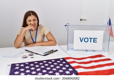 Young Brunette Woman At Political Election Sitting By Ballot Looking Stressed And Nervous With Hands On Mouth Biting Nails. Anxiety Problem. 