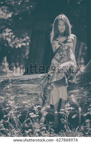 Similar – Image, Stock Photo Blonde girl with hat and hands in the head enjoying relaxed the nature in forest.