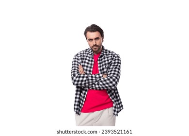 young brutal european brutal guy with gorgeous hair and beard on a white background with copy space - Shutterstock ID 2393521161
