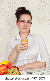 Young Buisness Woman Drinking Orange Juice