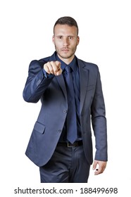 A Young Buisnessman Pointing Finger At You Isolated On A White Background