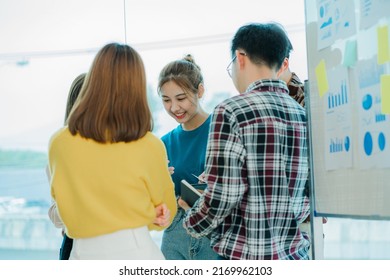 Young Business Finance Teams In Asia Stand Together To Brainstorm Projects Plan A Strategy Small Startup Or Office Collaboration Ideas