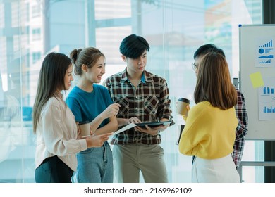 Young Business Finance Teams In Asia Stand Together To Brainstorm Projects Plan A Strategy Small Startup Or Office Collaboration Ideas