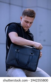 Young  Business Man In Classic Look Walking On The Street With Briefcase Designer Leather Laptop Satchel Portfolio Messenger Bag.  Different Color Of Bag And No Logo.