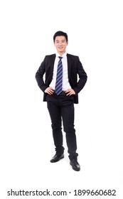 Young Business Man Laughing With Fists Up High Quality Photo