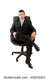 Young Business Man Sitting In A Chair And Relaxing, Isolated On White