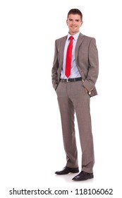  Young Business Man Standing With His Hands In The Pockets