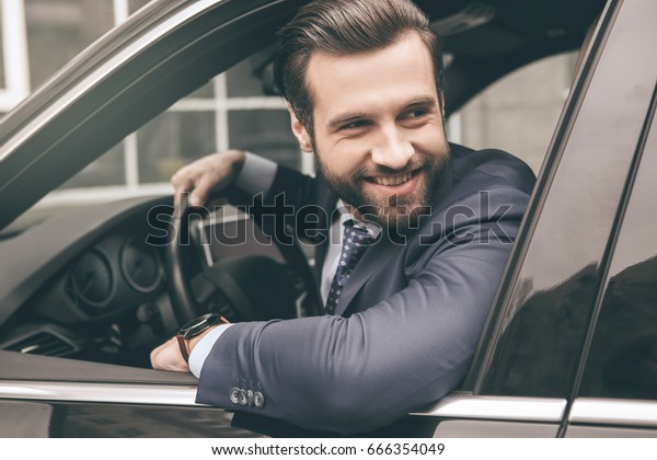  Young business man
test drive new car