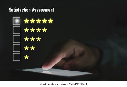 A Young Business Man Is Using A New Touch To A Virtual Screen In A 5-star Customer Satisfaction Assessment Concept.