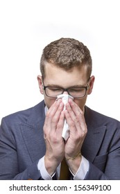 Young Business Man Using A Tissue