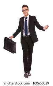 Young Business Man Wearing Glasses And Holding A Hand Case, Welcoming While Walking, On White Background