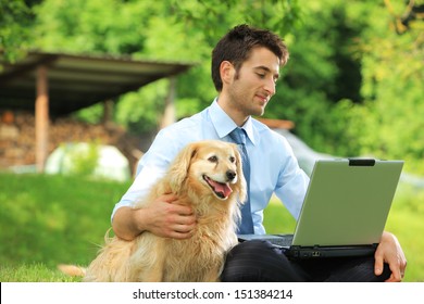 Young Business Man Working Outdoors With Laptop