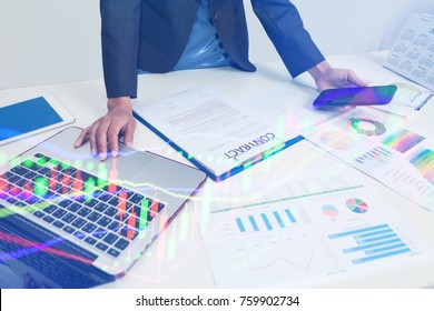 Young Business Managers crew Working with new Startup project. Businessman Research the financial Statements of the Company. To analyze the feasibility of business prior to Mergers and acquisitions. - Shutterstock ID 759902734
