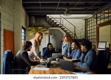 Young business partners having meeting in office - Powered by Shutterstock