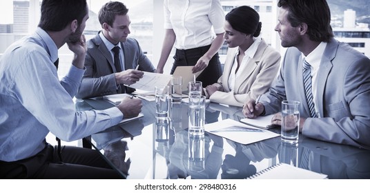 Young Business People In Board Room Meeting At The Office