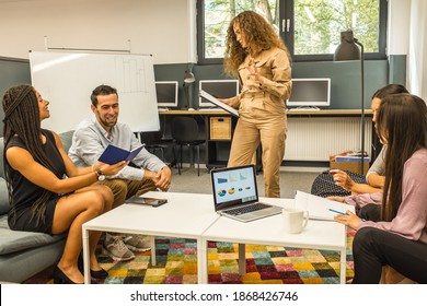 Young Business People In Discussion, Mixed Woman Race. Creative Team Meeting In Modern Work Space. We Are Stronger Together. Female Chef. An Empowered Workplace.