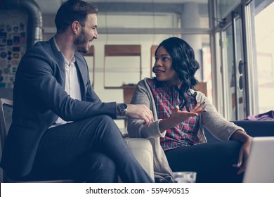 Young business people having discussion.  - Shutterstock ID 559490515
