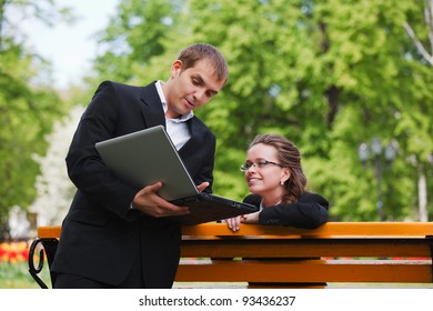 Young Business People With Laptop