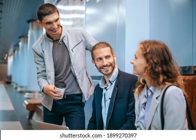 Young Business People With A Laptop On The Subway Platform.