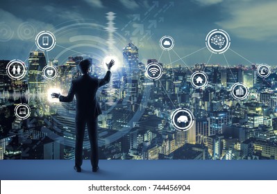 young business person and graphical user interface concept. Artificial Intelligence.  Internet of Things. Information Communication Technology. Smart City. digital transformation. - Shutterstock ID 744456904
