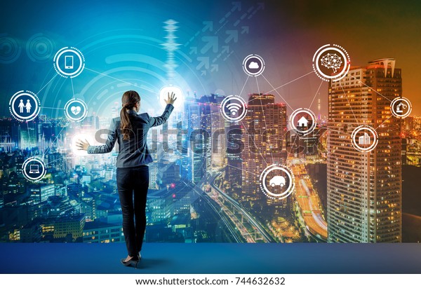 young\
business person and graphical user interface concept. Artificial\
Intelligence.  Internet of Things. Information Communication\
Technology. Smart City. digital\
transformation.