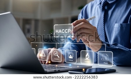 Young business pointing to HACCP - Hazard Analysis and Critical Control Points, Management system in which food safety.