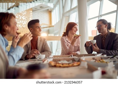 Young business team enjoys to have a lunch break in a friendly atmosphere in the company building together. Business, people, company - Powered by Shutterstock