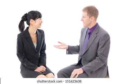 Young Business Team Talking On White Background