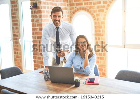 Young business team of woman and man working together at the office