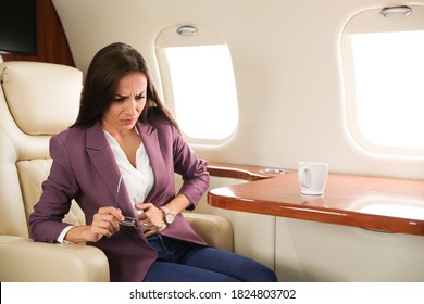 Young Business Woman Feeling Sick During Flight