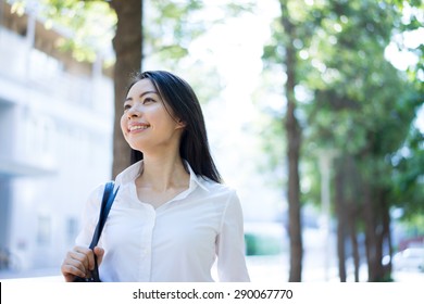 Young Business Woman Going To Work