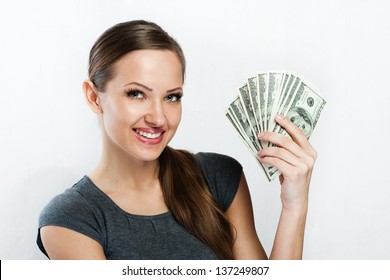 Young Business Woman Holding Money