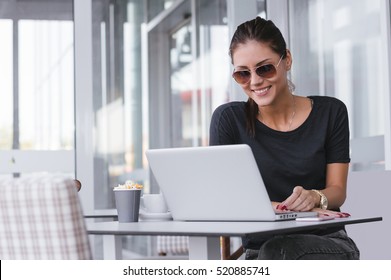 Young Business Woman With Laptop