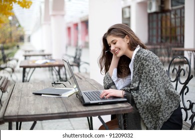 Young Business Woman With Laptop