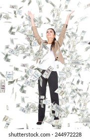 Young business woman and money banknotes flying in air on the white background.