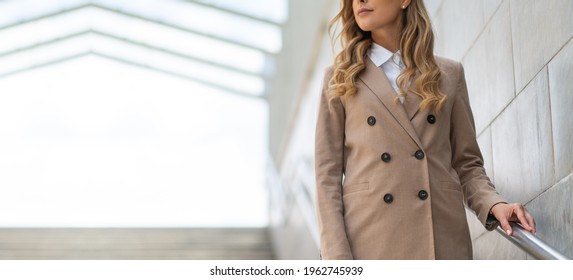 Young Business Woman On Subway Stairs