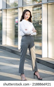 Young Business Woman Standing Outside The Office