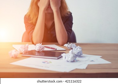 Young Business Woman Tired And Worry About Work.