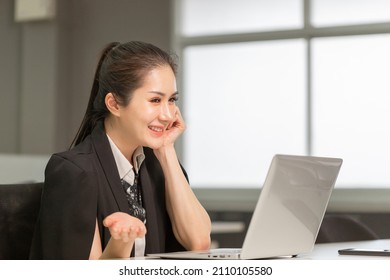 Young Business Woman Video Conference Calling On Laptop Computer. Excited Pretty Girl In Office, Woman Working In Her Home Office