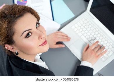 Young Business Woman Working At Her Office. High Angle View.