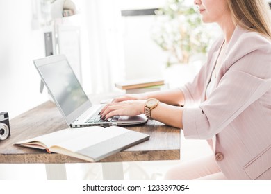 Young business woman working at home. Creative Scandinavian style workspace - Shutterstock ID 1233397054