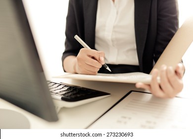Young business woman working at office - Shutterstock ID 273230693