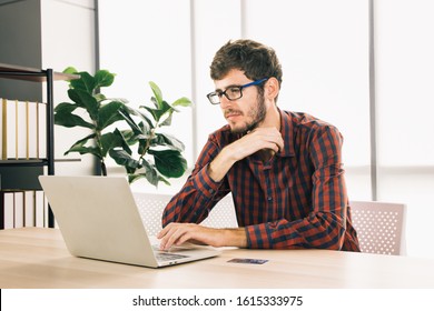 Young businessman is broadcasting live and communication on his laptop. He use technology to sell products and shop online.  Including the promotion of products in his store. Business concepts.