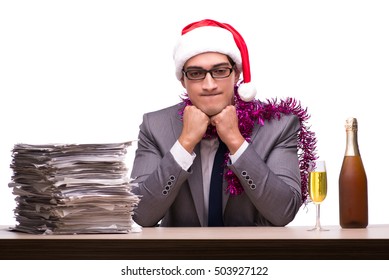 Young Businessman Celebrating Christmas In Office