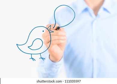 Young businessman drawing social media communication concept. Isolated on white. - Powered by Shutterstock