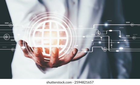 Young businessman holding a virtual globe in his hand, New technologies, big data, and business process strategies, internet and networking concept.